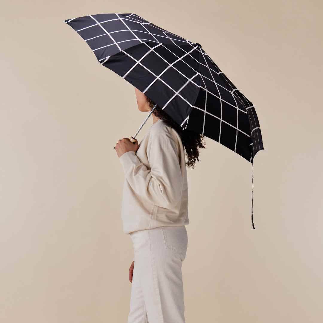 Stylish Black Grid Compact Eco-friendly Duck Umbrella - Image 4